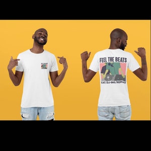 May include: White t-shirts with a graphic design. One shirt shows the front with a small design, the other shows the back with the text "FEEL THE BEATS" above a DJ graphic and the text "EAT/DJ-ING/REPEAT".