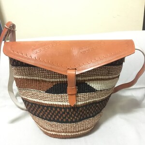 Woven sling bag, African woven sling bag, woven bag ,travel bag, road trip bag, leather bag, leather purse, Shoulder bag, Cross body bag