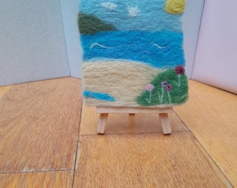 Paesaggio di spiaggia infeltrito ad ago