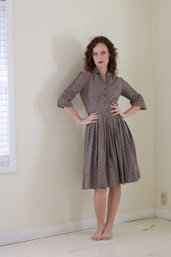 vintage 1950s patterned dress “ fashioned by soror