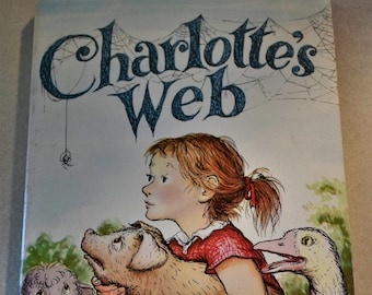 Charlotte's Web by E.B. White. Paperback, Scholastic Book Services, Paperback, Young Adult.