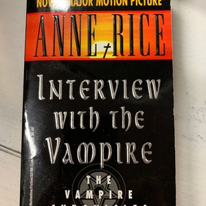 Interview with the Vampire (Book 1 of the Vampire Chronicles) by Anne Rice. Paperback. Ballantine, 1977.  Lestat.