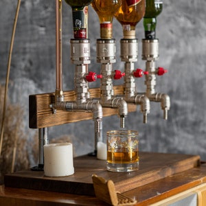 The whiskey dispenser: a father's perfect gift, adding a touch of sophistication to his home bar. An elegant and practical gift that will elevate his drinking experience.