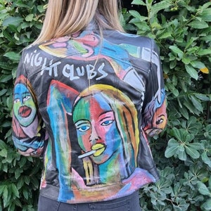 Vintage Hand Painted Genuine Leather Biker Jacket: Unique Style with Studded Details, Authentic Expression of Elegance and Individuality.