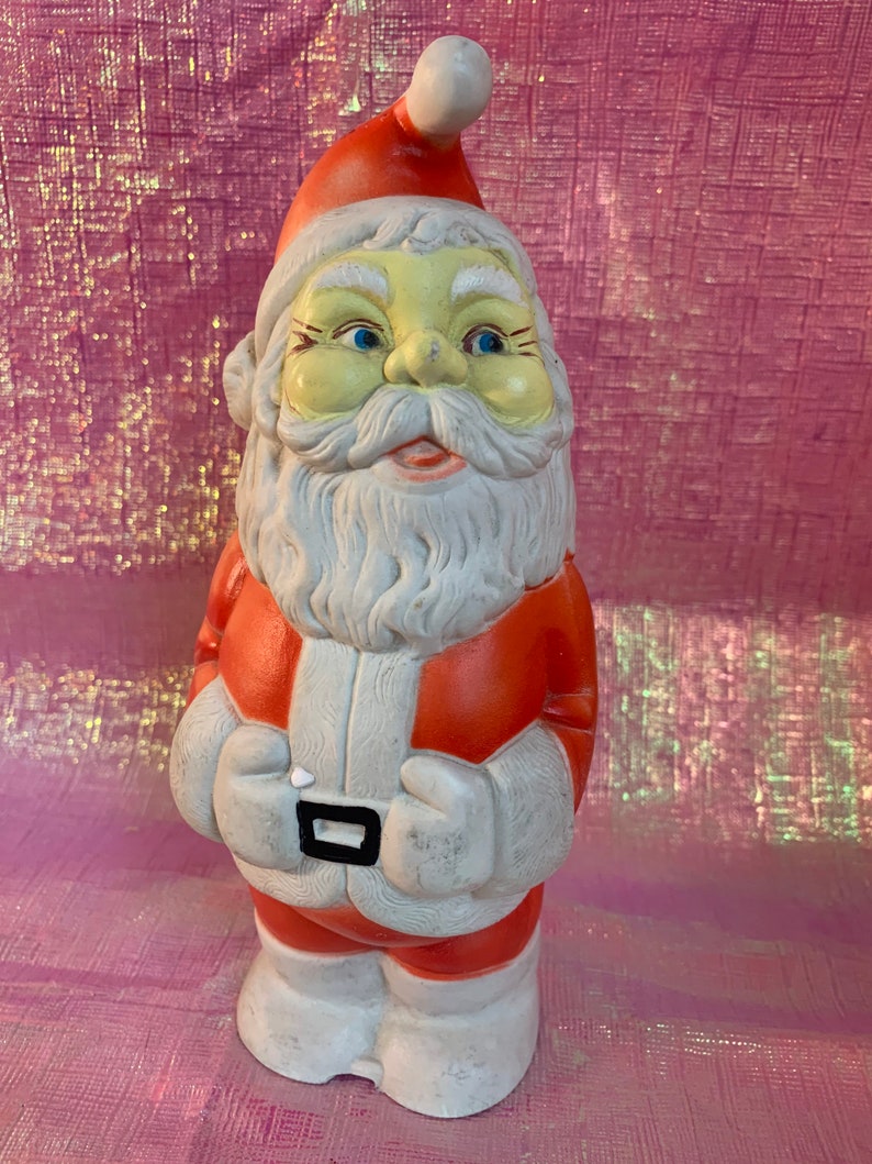 Vintage rubber Santa squeak toy