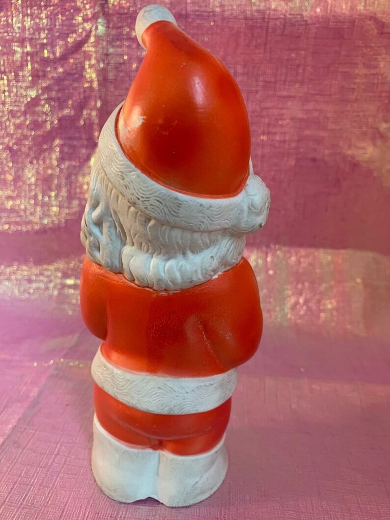 Vintage rubber Santa squeak toy