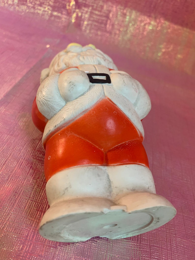 Vintage rubber Santa squeak toy