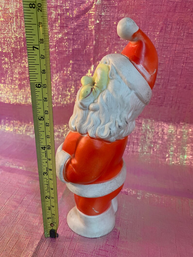 Vintage rubber Santa squeak toy