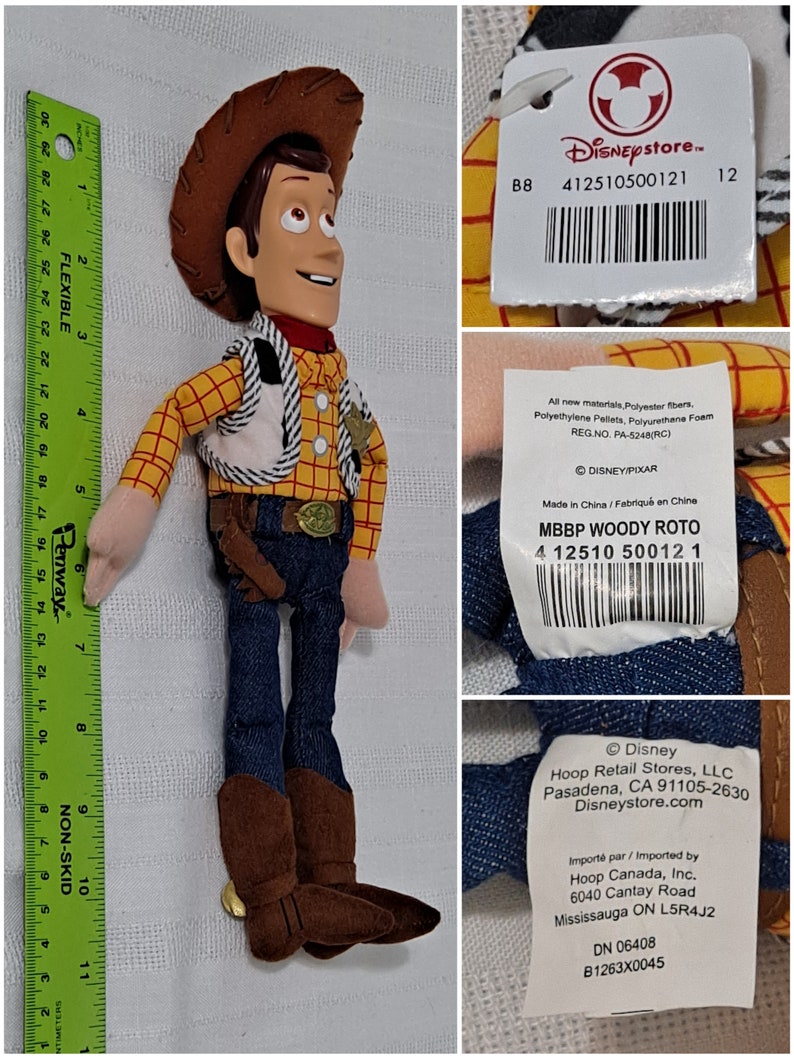 May include: A plush toy of Woody from the Toy Story franchise. Woody is wearing his signature cowboy hat, vest, and jeans. The toy is approximately 12 inches tall. The toy has a Disney Store tag attached to it with the text "Disneystore. 412510500121 12 B8" and a barcode.