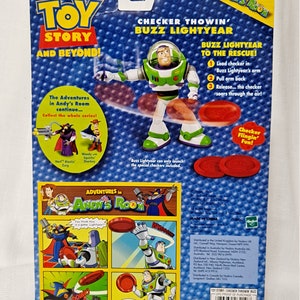 May include: Toy Story action figure of Buzz Lightyear from the Disney Pixar movie Toy Story. Buzz Lightyear is wearing his signature space ranger suit and is holding a red flying disc. The packaging features the Toy Story logo and the words "Checker Throwin' Buzz Lightyear" and "Adventures in Andy's Room".