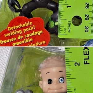 May include: A green and black Buzz Lightyear action figure with a detachable welding pack. The figure is approximately 5 cm tall and is packaged in a clear plastic blister pack. The packaging includes the text "Detachable welding pack! Trousse de soudage amovible Idadura".