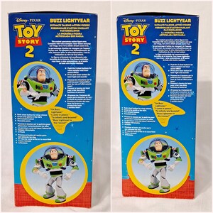 May include: Buzz Lightyear action figure from Toy Story 2. The figure is green, white, and purple with a clear visor. The figure has articulated arms and legs and a button on the chest. The box features the Toy Story 2 logo and text that reads "I'm Buzz Lightyear." "To infinity and beyond!" and "Buzz Lightyear to the rescue!"