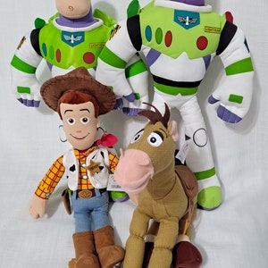 Vintage New with tags Disney Pixar Toy Story Buzz Lightyear Sheriff Woody Core sized Plush Doll Disney Store exclusive