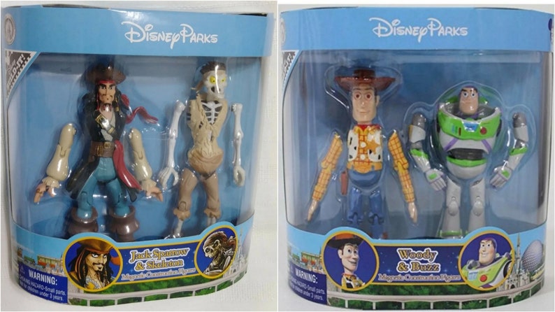 May include: Two sets of Disney Parks character figures. The first set features Jack Sparrow and a skeleton, both with posable limbs. The second set features Woody and Buzz Lightyear, also with posable limbs. Both sets are packaged in clear plastic boxes with blue backgrounds and the Disney Parks logo.