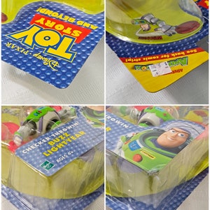 May include: Toy Story Buzz Lightyear Checker Throwin' game packaging. The packaging is yellow, blue, and green with a picture of Buzz Lightyear on the front. The game is for ages 4 and up.