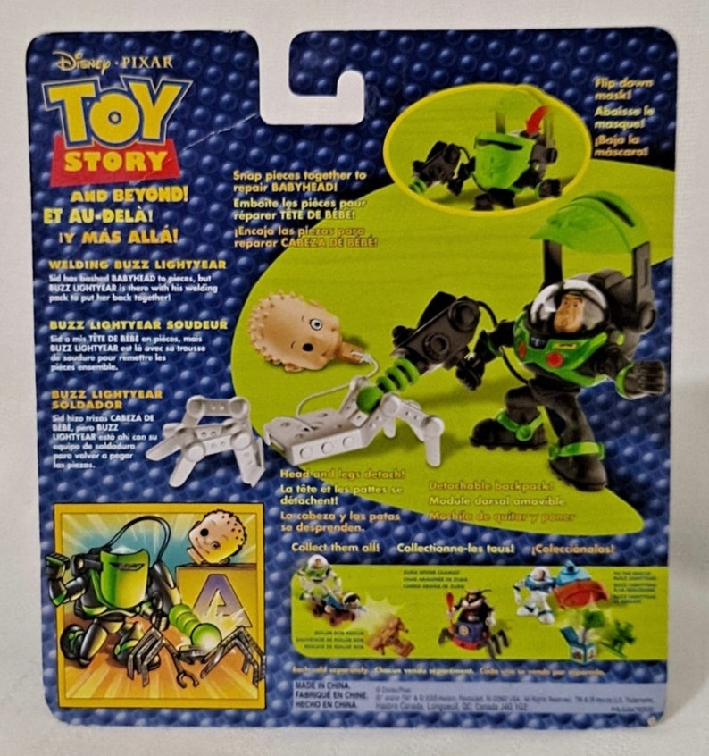 May include: Toy Story Buzz Lightyear action figure with a green and black suit and a detachable backpack. The figure is holding a welding tool and has a flip-down mask. The packaging includes the text "Toy Story And Beyond!" and "Welding Buzz Lightyear".