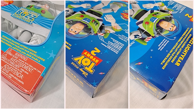 May include: A blue and white box with a picture of Buzz Lightyear from Toy Story 2. The box features the text "Buzz Lightyear" and "Toy Story 2".