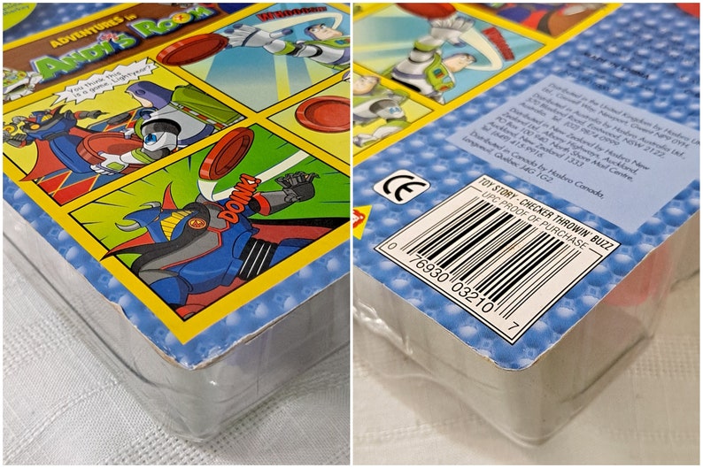 May include: Toy Story Checker Throwin' Buzz game box with a blue and red robot character on the front and a barcode on the back. The box is blue and yellow with a white background.