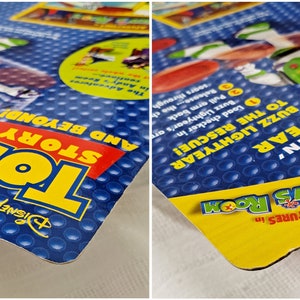 May include: A yellow and blue cardboard box with a picture of Buzz Lightyear from the Toy Story franchise. The box has the text "Adventures in Andy's Room" and "Toy Story and Beyond" on it.