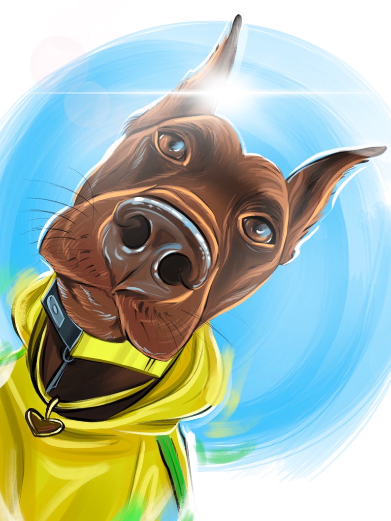May include: A brown and black Doberman Pinscher dog wearing a yellow hoodie with a heart-shaped charm on the zipper. The dog is looking directly at the camera with a playful expression.