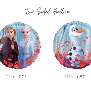 May include: A round two-sided balloon featuring the text Two Sided Balloon. Side one displays two characters with brown and blonde hair in a forest with orange leaves. Side two shows a white snowman character in the same forest setting.