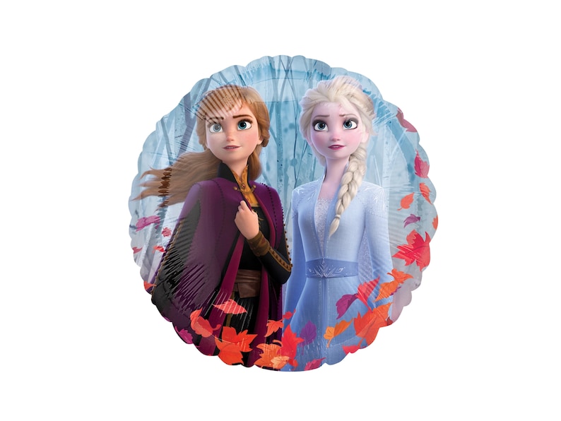 May include: A round foil balloon featuring a printed illustration of two characters, one with auburn hair in a purple coat and the other with platinum blonde hair in a light blue dress, set against a forest background with scattered red autumn leaves.