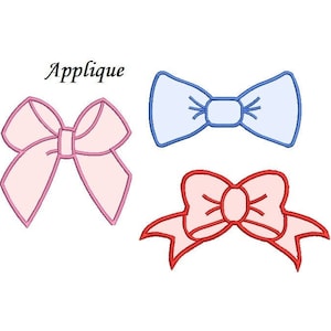 May include: Three applique designs of bows. One is pink, one is blue, and one is red.