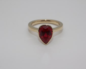 Solid 10K Yellow Gold Pear Synthetic Ruby Ring - 50 TREES PLANTED
