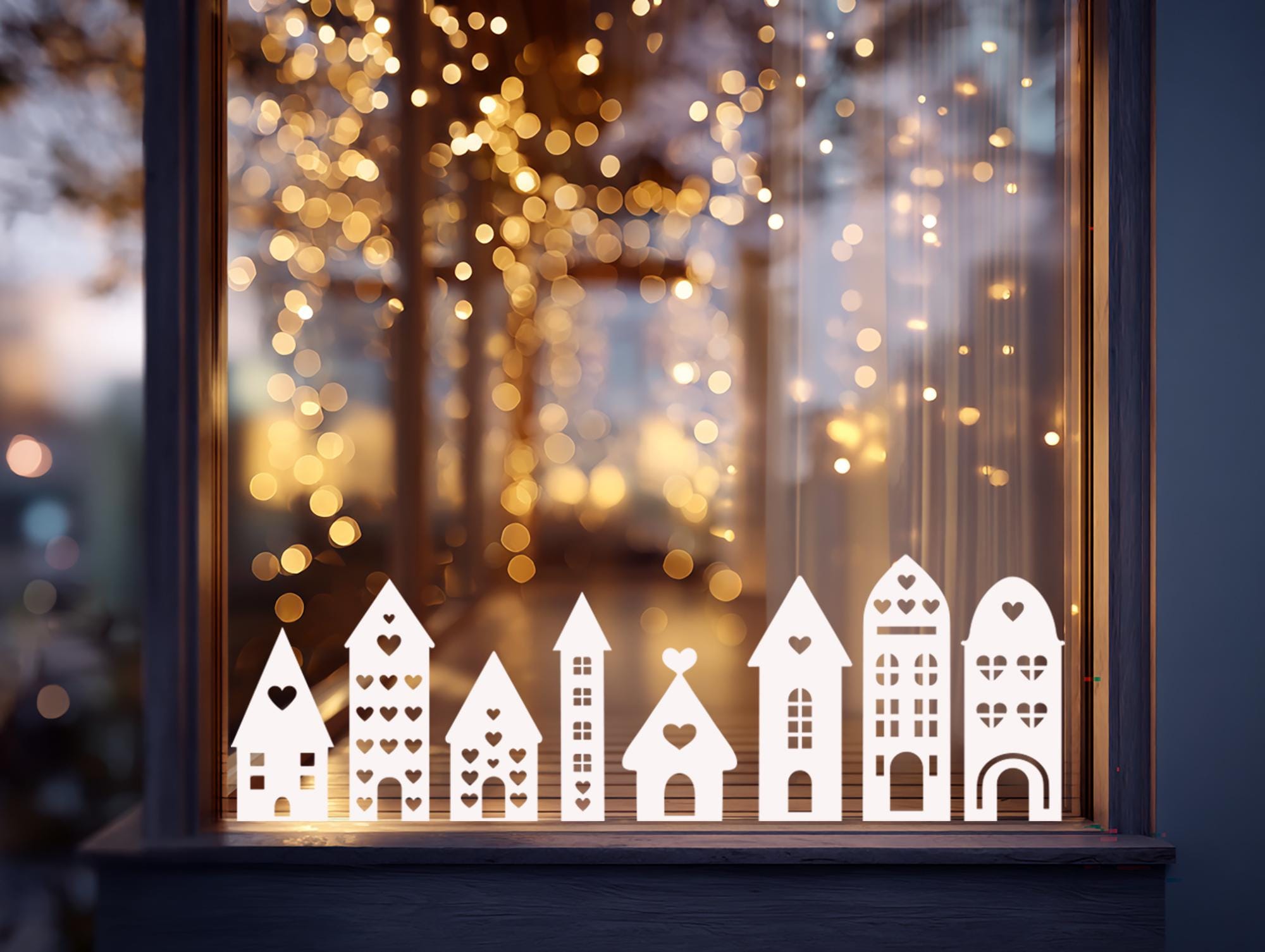 Paquete de siluetas de casas de pueblo navideño / Casas cortadas con ...