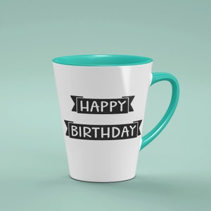 May include: A white conical mug with a teal interior and handle. The front features the black text HAPPY BIRTHDAY printed in two separate banner designs, with HAPPY on the top banner and BIRTHDAY on the bottom banner in a simple font.