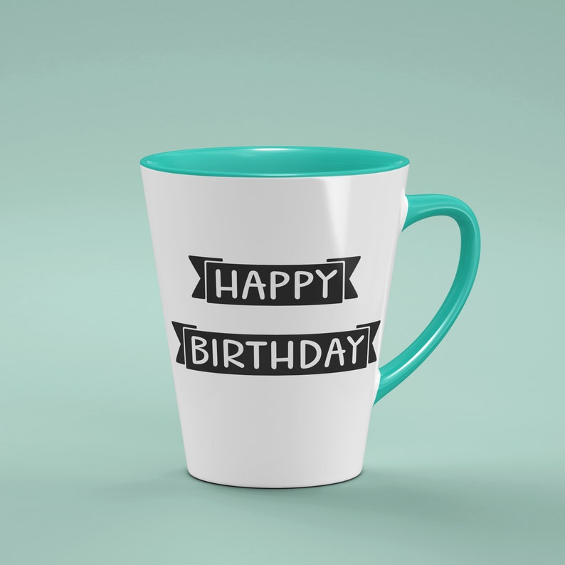 May include: A white conical mug with a teal interior and handle. The front features the black text HAPPY BIRTHDAY printed in two separate banner designs, with HAPPY on the top banner and BIRTHDAY on the bottom banner in a simple font.