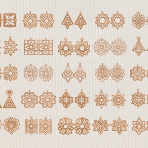 May include: A collection of laser-cut wooden earrings in various floral and geometric designs. The earrings are in shades of brown and feature intricate cut-out patterns. The image showcases a variety of styles, including teardrop, round, and square shapes.