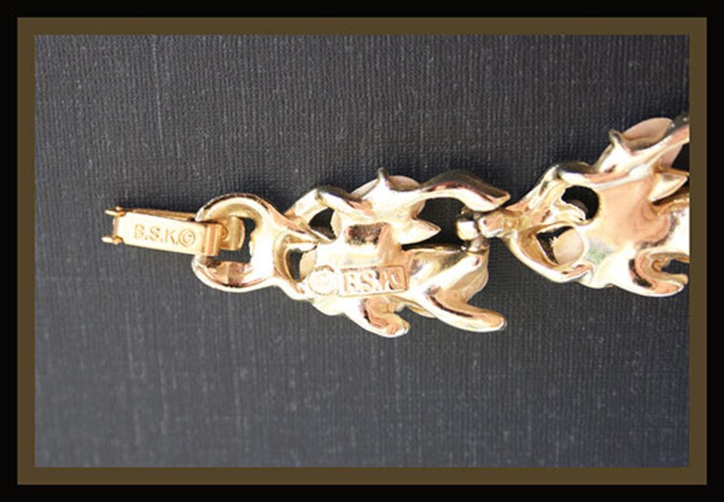 vintage silver-tone and white lucite bracelet signed B.S.K.