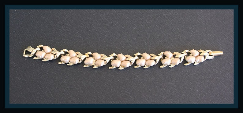 vintage silver-tone and white lucite bracelet signed B.S.K.