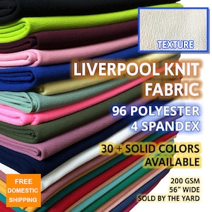 May include: A stack of colorful Liverpool knit fabric samples. The image displays a variety of solid colors, including black, green, pink, blue, and red. The fabric is 56 inches wide and made of 96% polyester and 4% spandex. The image also includes the text "Liverpool Knit Fabric".