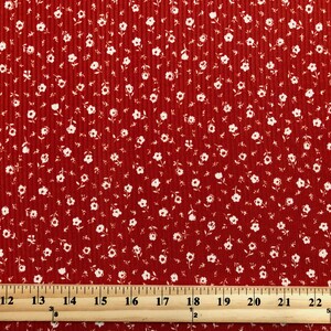 Brick White 1/4" Buttercup Flowers Print Fabric Rayon Spandex Rib 2X1 Print Fabric