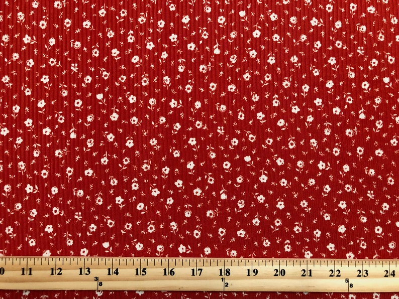 Brick White 1/4" Buttercup Flowers Print Fabric Rayon Spandex Rib 2X1 Print Fabric