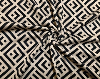 Tissu tricoté losanges géométriques DTY taupe/noir par mètre
