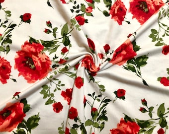 Tessuto a maglia spazzolata DTY con motivo floreale di rose avorio/rosse, tagliato su misura.