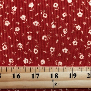 Brick White 1/4" Buttercup Flowers Print Fabric Rayon Spandex Rib 2X1 Print Fabric