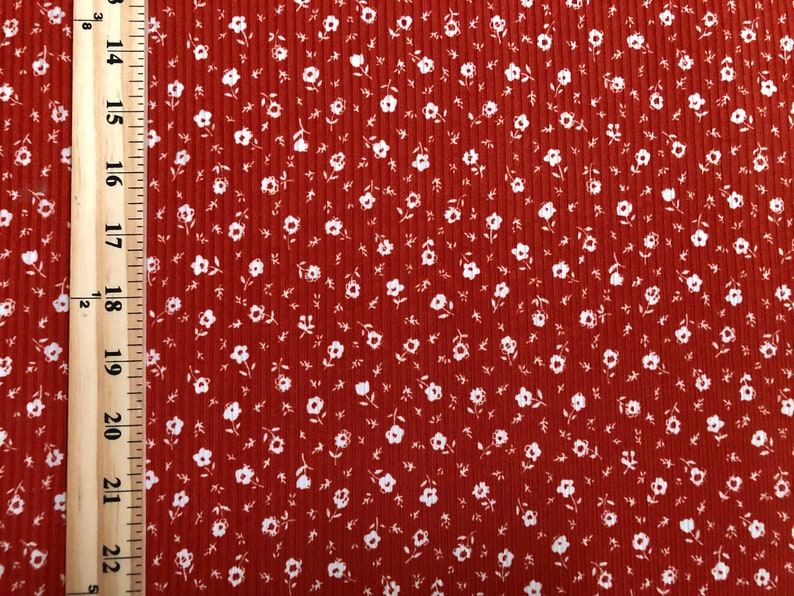 Brick White 1/4" Buttercup Flowers Print Fabric Rayon Spandex Rib 2X1 Print Fabric