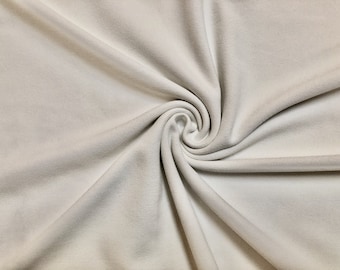 Ivory Solid 95/5 Polyester/Spandex Stretch Polyester Twill Knit Fabric by the Yard