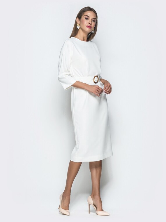 white dresses with sleeves and below the knee