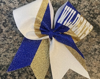 Glitter cheer bow and dance bow made in your personlized team colors. Competition cheerleading bows or gameday bows with team name.