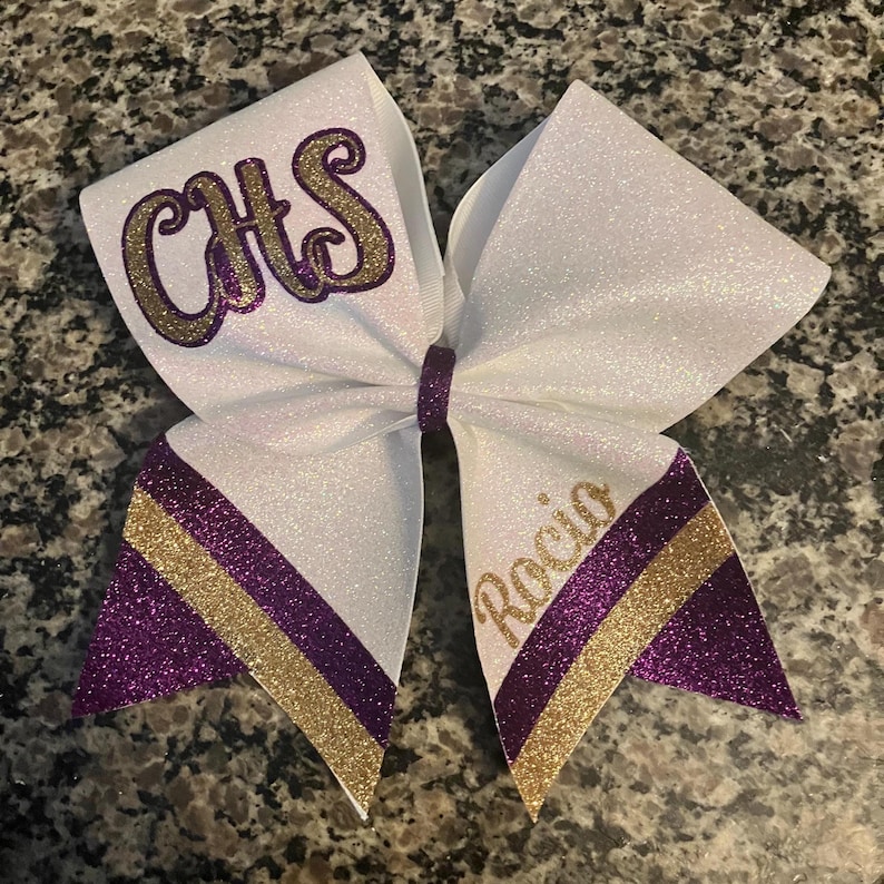 purple and gold CHS cheerleading comp bow