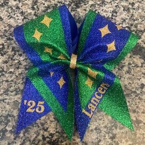 Cheer bow in full glitter, diamond cheer bow, blue cheer bow, gold cheer bow, custom cheer bows in any color. Competition dance bow / cheer