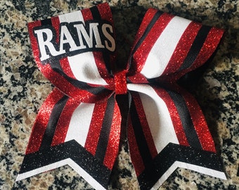 Personalized cheer bow with stipes and team name. Bulk team cheer bows for school cheer or softball bows.