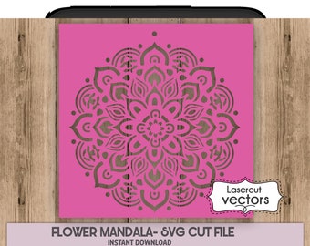 May include: A pink digital download file for a flower mandala design. The mandala is a circular pattern with intricate details. The text "Lasercut vectors" is in a white box with a black border.