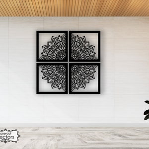 May include: A set of four black square wall decor panels with intricate mandala designs. Each panel features a different section of the mandala, creating a cohesive and visually appealing design.
