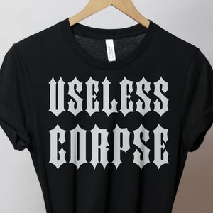 Useless Corpse Gothic Tee - Horror Top, Gothic Shirt, Witchy Clothing, Grunge Aesthetic, Spooky Gift, Occult, Emo Creepy Unisex